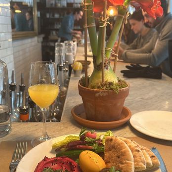 Shuka - Mediterranean Plate with beet hummus. Very good and beautiful bar. - Mediterranean Near Me - New York, New York