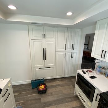 James Remodeling - finished fridge and pantry wall. We traded a walk-in pantry for tall cabinets with pull-out drawers. net increase in storage space. - General Contractors Near Me - Mission Viejo, California