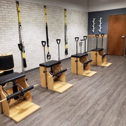 Indy House of Pilates - Our Wunda chairs and TRX straps are ready to serve your fitness needs!