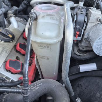 Audi Novi - Broken expansion tank leaking coolant - Car Dealers Near Me - Novi, Michigan Audi Novi - Broken expansion tank leaking coolant - Car Dealers Near Me - Novi, Michigan