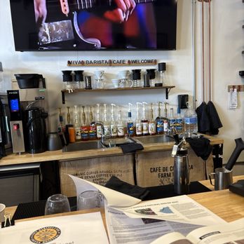 Viva Barista Cafe - The TV and behind the counter at Viva barista Café - Coffee & Tea Near Me - Winston-Salem, North Carolina Viva Barista Cafe - The TV and behind the counter at Viva barista Café - Coffee & Tea Near Me - Winston-Salem, North Carolina