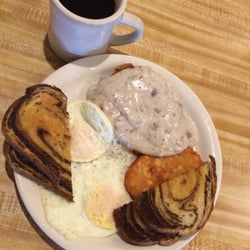 Yankee Village Restaurant - Country fried steak smothered in their ace sausage gravy, eggs over easy, rye toast, hash brown and coffee!
