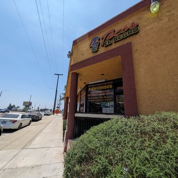 Tacos El Negro - Looking down the street, it's at the corner of the plaza - Mexican Near Me - South Gate, California Tacos El Negro - Looking down the street, it's at the corner of the plaza - Mexican Near Me - South Gate, California
