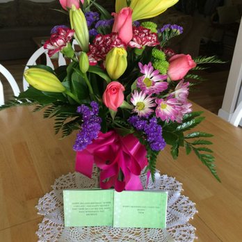 A Wildflower - This is the arrangement my mom received. No cymbidium orchid or gerbera daisies. A $50 value at the most. - Florists Near Me - Gardnerville, Nevada A Wildflower - This is the arrangement my mom received. No cymbidium orchid or gerbera daisies. A $50 value at the most. - Florists Near Me - Gardnerville, Nevada