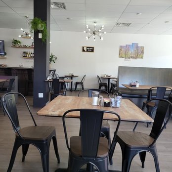 Eves Eatery - tables and chairs in a restaurant - Pizza Near Me - Carson City, Nevada Eves Eatery - tables and chairs in a restaurant - Pizza Near Me - Carson City, Nevada