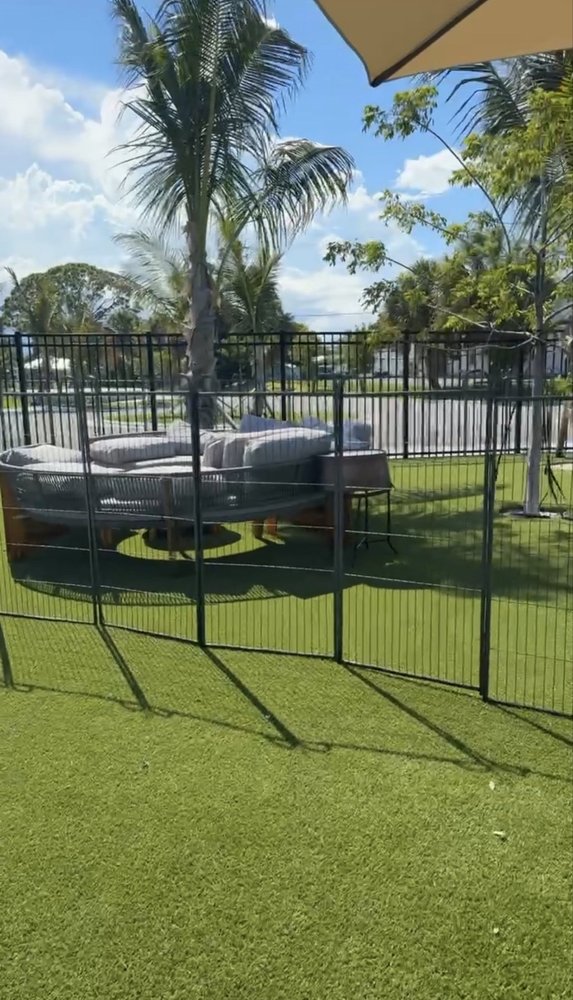 Baxter's Doghouse - A small dog area - outside - Tiki Bars Near Me - Stuart, Florida Baxter's Doghouse - A small dog area - outside - Tiki Bars Near Me - Stuart, Florida
