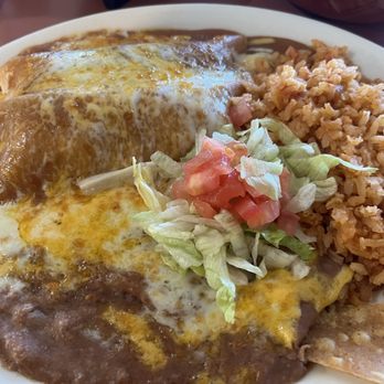 El Rodeo Mexican Restaurant - #13 2 enchiladas plate. One with shredded beef and the other shredded chicken - Mexican Near Me - Clovis, California El Rodeo Mexican Restaurant - #13 2 enchiladas plate. One with shredded beef and the other shredded chicken - Mexican Near Me - Clovis, California