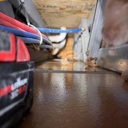 Paul Davis Restoration - Inspecting pipes in Fayetteville