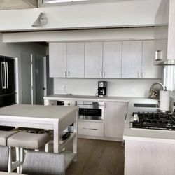Jorgensen's Cabinets - Slab door style cabinets were chosen for the job. We also offer Shaker door style for the cabinets!