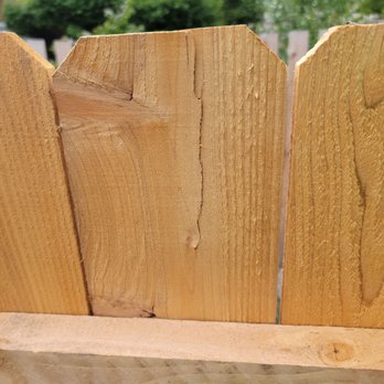 Aztec Fence Company - Just ONE of the many cracked and split boards they used - Fences & Gates Near Me - Round Lake, Illinois Aztec Fence Company - Just ONE of the many cracked and split boards they used - Fences & Gates Near Me - Round Lake, Illinois