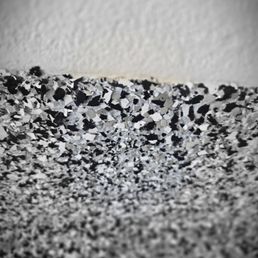 sides that go up from the floor was not sealed, so the flakes are coming off.