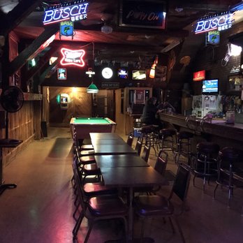 Mike's Place - a pool table and neon signs - Bars Near Me - Bryan, Ohio