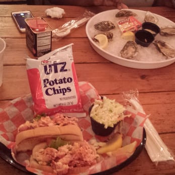 Phillips Seafood - Lobster rolls, a side of colesaw, and a bag of UTZ potato chips. My friend got oysters. - Seafood Near Me - Baltimore, Maryland Phillips Seafood - Lobster rolls, a side of colesaw, and a bag of UTZ potato chips. My friend got oysters. - Seafood Near Me - Baltimore, Maryland