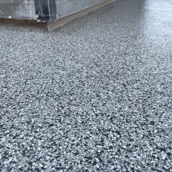 Elite Protective Coatings - a close up of a concrete driveway - Flooring Near Me Elite Protective Coatings - a close up of a concrete driveway - Flooring Near Me