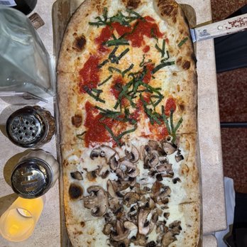 Numero 28 - Pesto Pizza (18") Margherita Pizza (18") - Italian Near Me - Austin, Texas Numero 28 - Pesto Pizza (18") Margherita Pizza (18") - Italian Near Me - Austin, Texas