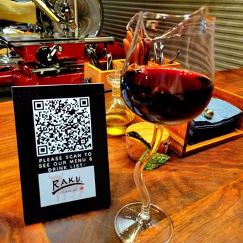 Casa de Raku - Spanish wine in a rose shaped glass - Tapas Bars Near Me - Las Vegas, Nevada Casa de Raku - Spanish wine in a rose shaped glass - Tapas Bars Near Me - Las Vegas, Nevada