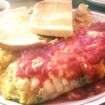 The Courier Cafe - Spanish omelette, crispy hash! GREAT choice - Breakfast & Brunch Near Me - Urbana, Illinois The Courier Cafe - Spanish omelette, crispy hash! GREAT choice - Breakfast & Brunch Near Me - Urbana, Illinois