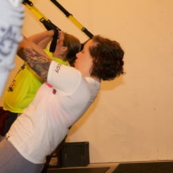 Full Bodied Fitness and Nutrition - TRX biceps curl at The Functional Body Shop fitness studio in Tacoma.