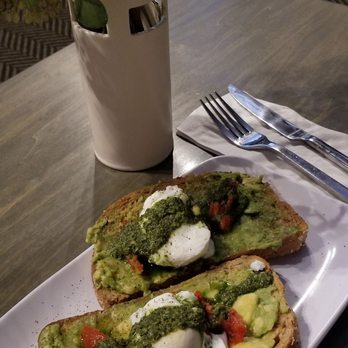 Grace - Avocado toast with poached egg, sun dried tomatoes, and pesto - Wine Bars Near Me - Yorkville, Illinois Grace - Avocado toast with poached egg, sun dried tomatoes, and pesto - Wine Bars Near Me - Yorkville, Illinois