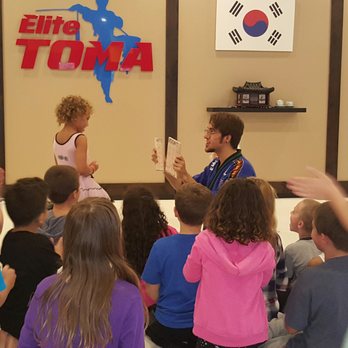 Elite TOMA Martial Arts - Breaking the board! So very impressed! - Martial Arts Near Me - Randolph, New Jersey