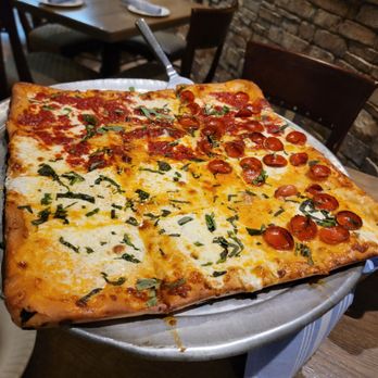 Gencarelli's - What i called a "Tipsy Grand-Margherita Pizza with half Pepperoni". Half pie was drunken vodka and other was Margherita. - Pizza Near Me - Pine Brook, New Jersey