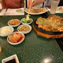 The side dishes are called banchan and with a seafood pancake make a tasty start to the meal. All are meant to be shared. The side dishes are called banchan and with a seafood pancake make a tasty start to the meal. All are meant to be shared.