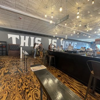 Four Finger Distillery - a bar with a sign that says this is here - Distilleries Near Me - Lebanon, Indiana