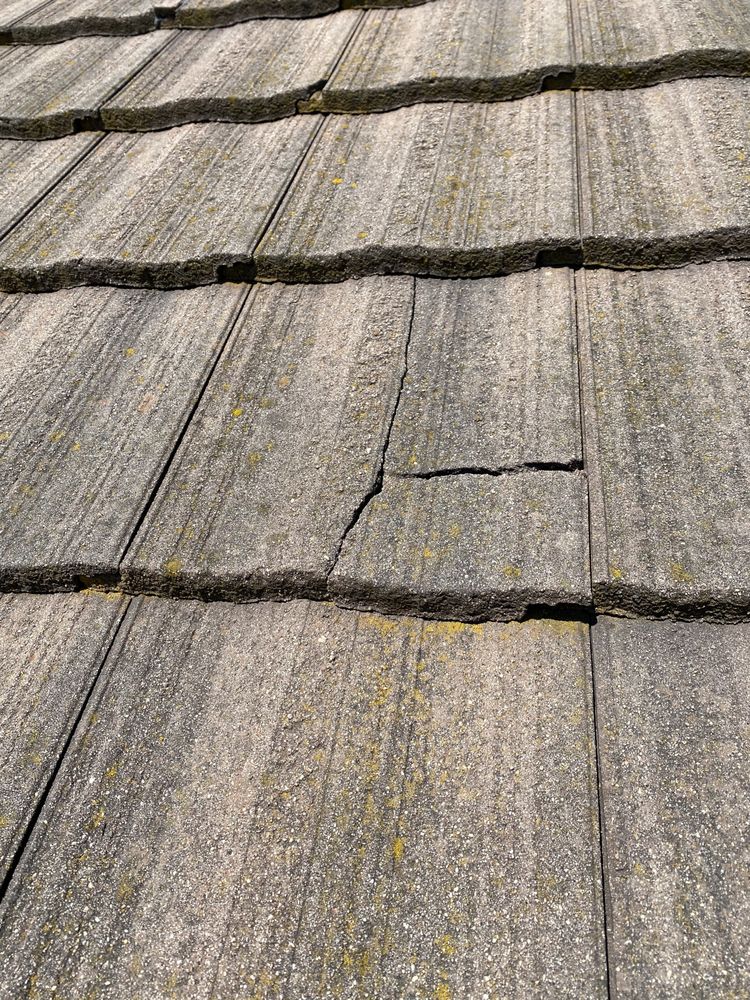 Slide of Valentine Roofing