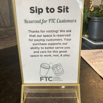 Fort Thomas Coffee - a sign stating customers to sip to sit - Coffee & Tea Near Me - Fort Thomas, Kentucky