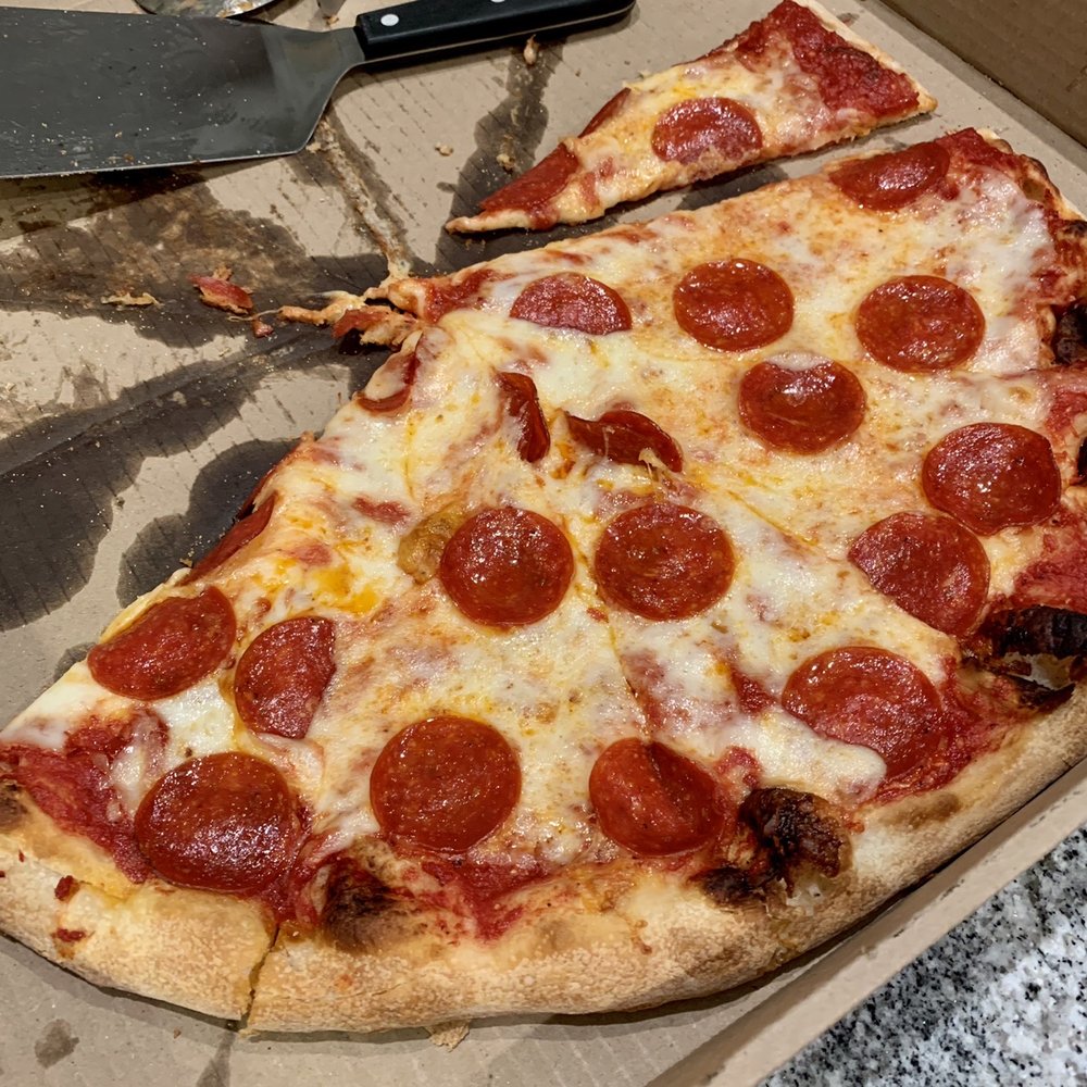 a slice of pepperoni pizza a slice of pepperoni pizza
