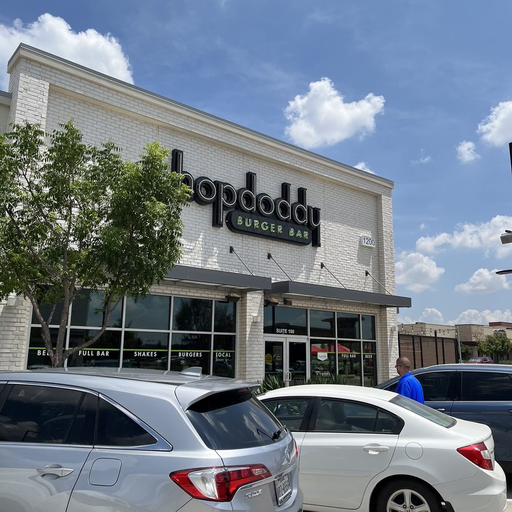 Hopdoddy Burger Bar - cars parked in front of the restaurant - Burgers Near Me - Euless, Texas Hopdoddy Burger Bar - cars parked in front of the restaurant - Burgers Near Me - Euless, Texas