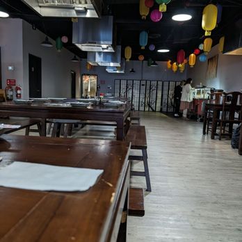 Lee's Bbq & Hot Pot - tables and chairs in a restaurant - Asian Fusion Near Me - Pensacola, Florida Lee's Bbq & Hot Pot - tables and chairs in a restaurant - Asian Fusion Near Me - Pensacola, Florida