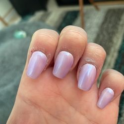 Lucky's Hair & Nails Salon - Messy skin around nails and nails are all different shapes and lengths!