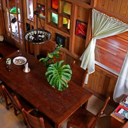 Your Hawaiian Retreat - Main House - view of dining room table from loft bed