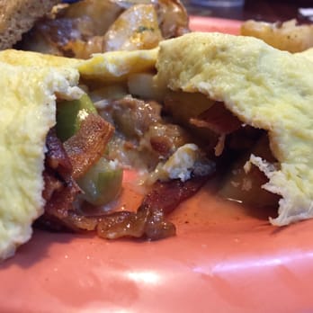 Squeeze In - In side the Zwyfully omelette It tastes pretty good for having peanut butter bananas and apples in a omelette... - Breakfast & Brunch Near Me - Truckee, California Squeeze In - In side the Zwyfully omelette It tastes pretty good for having peanut butter bananas and apples in a omelette... - Breakfast & Brunch Near Me - Truckee, California