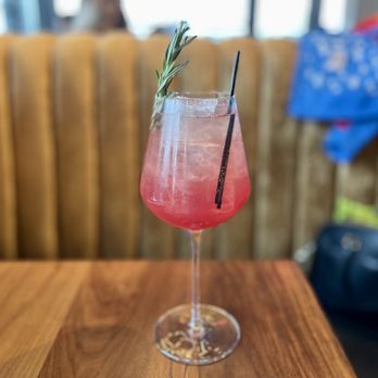 The Wheel - "Pom Spritz" (gin, pomegranate juice, prosecco) - New American Near Me - Stamford, Connecticut The Wheel - "Pom Spritz" (gin, pomegranate juice, prosecco) - New American Near Me - Stamford, Connecticut