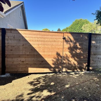 G & G Deck and Fence - Masssive steel framed gate that's been cut into uneven sections for ease of use! This is before stain. - Fences & Gates Near Me - Vallejo, California G & G Deck and Fence - Masssive steel framed gate that's been cut into uneven sections for ease of use! This is before stain. - Fences & Gates Near Me - Vallejo, California