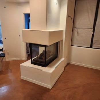 Custom Quality Drywall - Removed tile from the pedestal and above the fireplace. Framed in the mantel and finished with smooth drywall. - Drywall Installation & Repair Near Me Custom Quality Drywall - Removed tile from the pedestal and above the fireplace. Framed in the mantel and finished with smooth drywall. - Drywall Installation & Repair Near Me