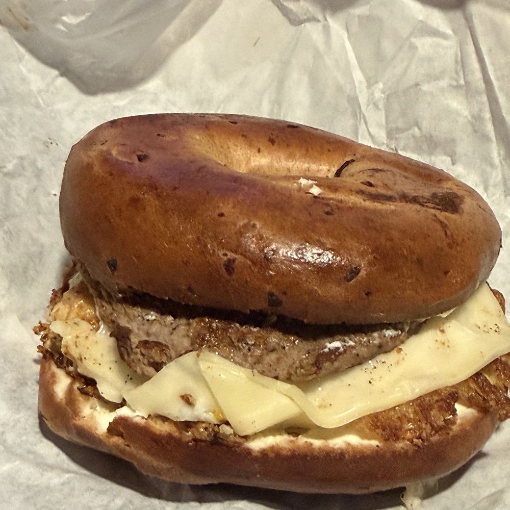 Tip Top Donuts - Turkey bacon, egg and cheese on a cinnamon raisin bagel - Donuts Near Me - Marietta, Georgia Tip Top Donuts - Turkey bacon, egg and cheese on a cinnamon raisin bagel - Donuts Near Me - Marietta, Georgia