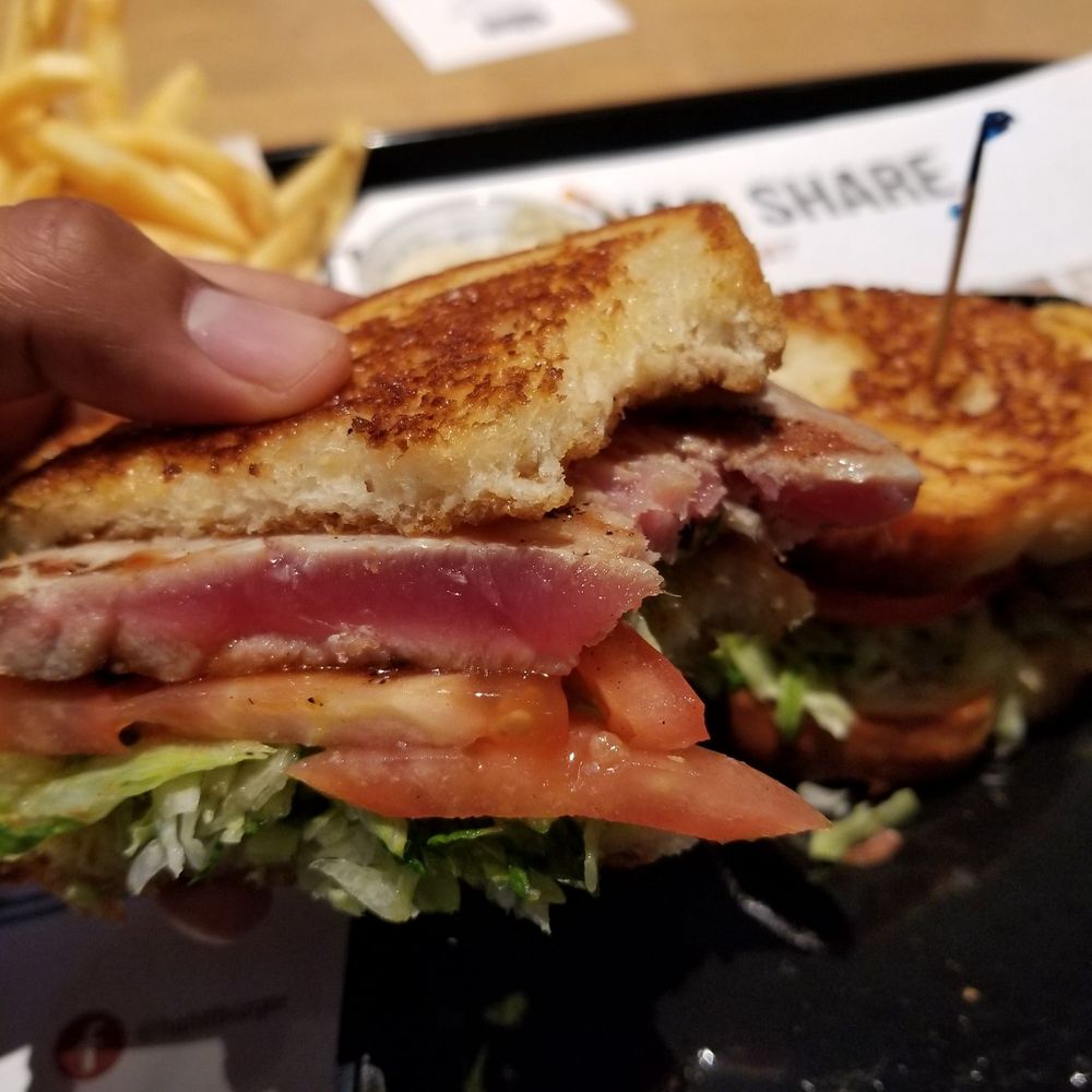 Habit Burger & Grill - The inside of my seared ahi sandwich on sourdough, nice and pink in the middle just how it should be. - Burgers Near Me - Escondido, California Habit Burger & Grill - The inside of my seared ahi sandwich on sourdough, nice and pink in the middle just how it should be. - Burgers Near Me - Escondido, California
