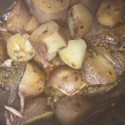 Poetic Spice Catering & Cocktails - Slow roasted beef shoulder smothered with potatoes onions and garlic