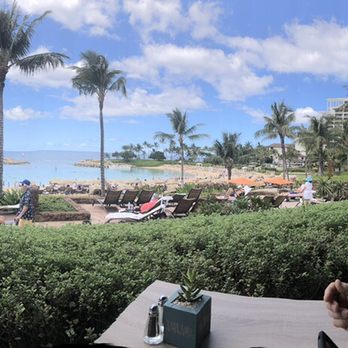 Ama Ama Restaurant - My husband at our table, the panorama was delightful. - New American Near Me - Kapolei, Hawaii Ama Ama Restaurant - My husband at our table, the panorama was delightful. - New American Near Me - Kapolei, Hawaii
