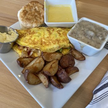 Ralph And Avas Kitchen and Bar - Veggie omelette, red potatoes, biscuit, side of sausage gravy and hollandaise - New American Near Me - Mooresville, Indiana Ralph And Avas Kitchen and Bar - Veggie omelette, red potatoes, biscuit, side of sausage gravy and hollandaise - New American Near Me - Mooresville, Indiana