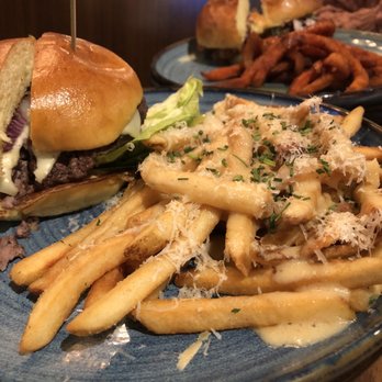 Eureka! - Truffle Cheese Fries, Honey-Cinnamon Sweet Potato Fries, Spicy Fried Chicken Sandwich, Eureka American* - American Near Me - Redlands, California