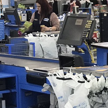 Walmart Supercenter - a woman at the cash register - Grocery Near Me - Davenport, Iowa Walmart Supercenter - a woman at the cash register - Grocery Near Me - Davenport, Iowa