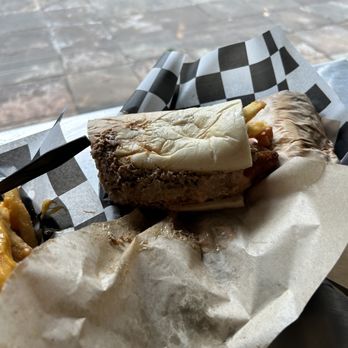 Fat Shack - The fat stickler it's a Philly cheesesteak with french fries and fried pickles - Sandwiches Near Me - Fort Collins, Colorado