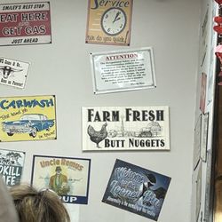 Lonnie's Roadhouse Cafe - Great signage to look at while waiting on your food. Loved the signs.