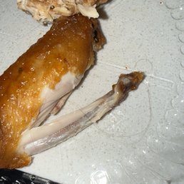 Wings with hair cooked into it.