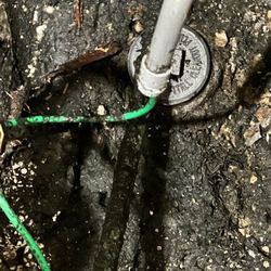 Universal Sewer and Drain - Water line directly above the sewer line cap. But Harold got the job done