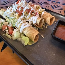Three rolled tacos Three rolled tacos